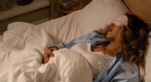 Sleeping woman in bed.