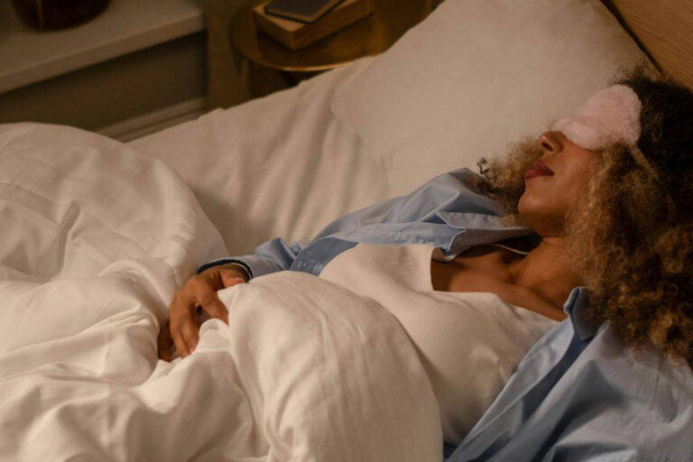 Sleeping woman in bed.