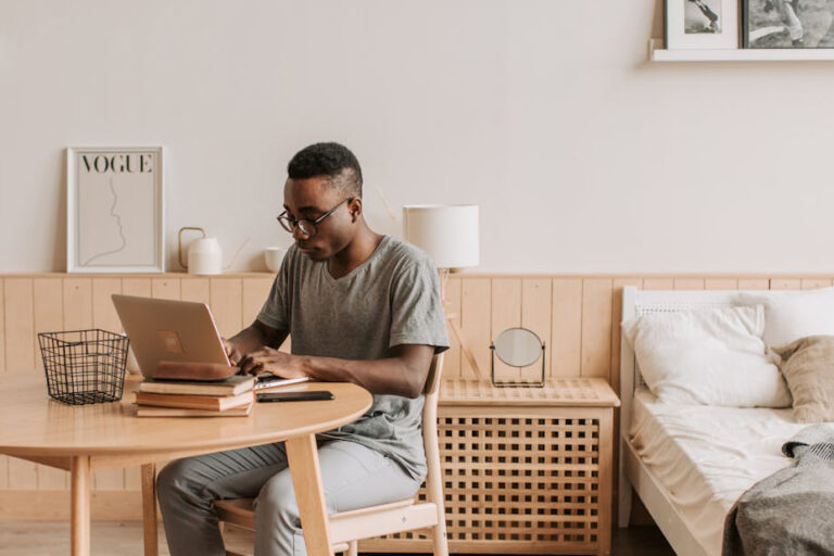Man sitting and working at the table.
